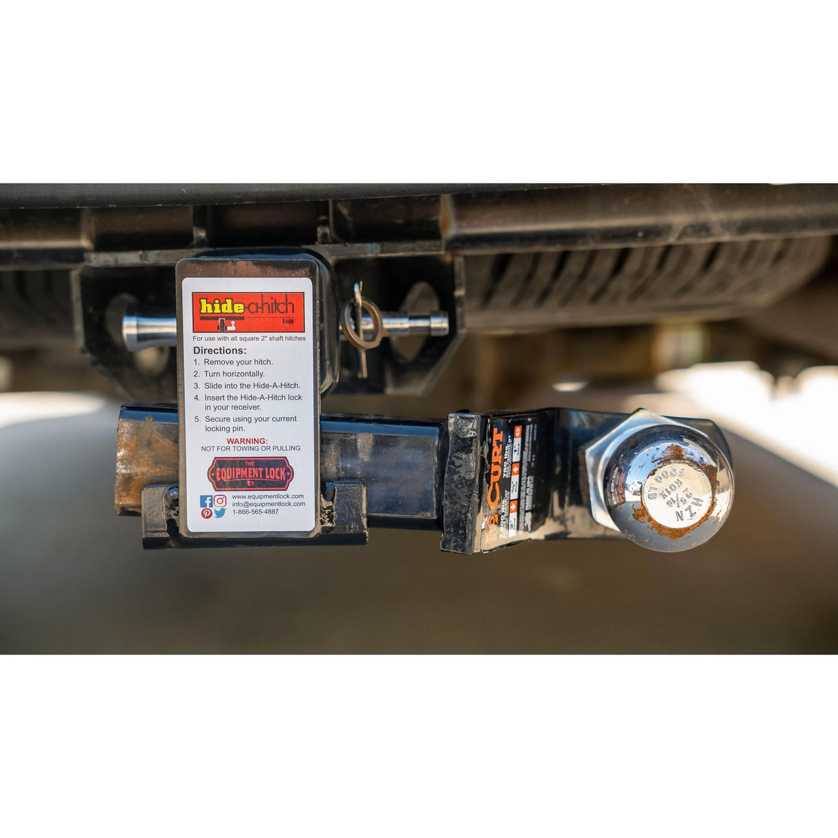 Hide-A-Hitch Trailer Hitch Lock Under Bumper Security And Shin Protection For All Vehicles by The Equipment Lock Company