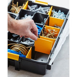 STANLEY 1-94-745 organizer box with adjustable yellow dividers, various screws and wall plugs, close-up angle.