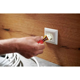 12–1,000V AC – A person using a non-contact voltage detector on an electrical outlet.