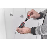 Person holding a screwdriver with a detachable bit holder