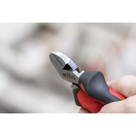 Industrial side cutter with red and black handles