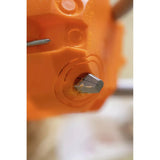 Close-up of an orange plastic tool with a metal screw inserted.