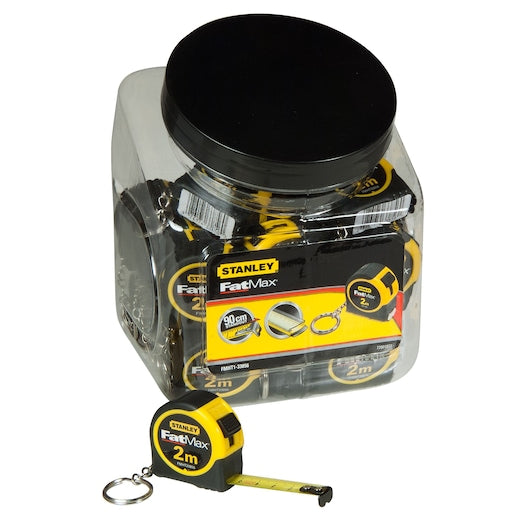 Photo of STANLEY FMHT1-33856 FatMax 2m tape measure jar with multiple yellow and black tape measures.