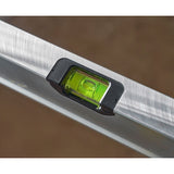 Photo of STANLEY FMHT43678-1 spirit level close-up, showing green vial on silver body.