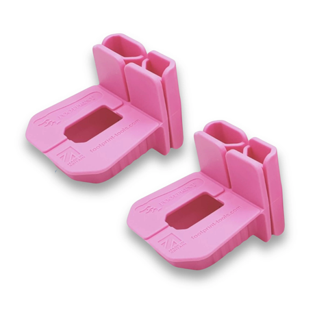 Footprint pink plastic brick line and corner blocks with gauge window and easy-grip handles.