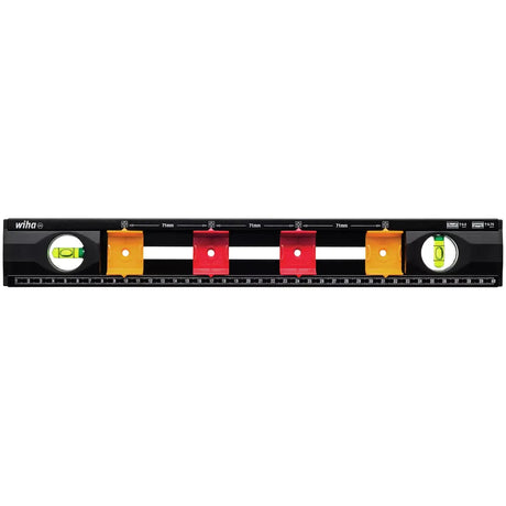 Black spirit level with two green vials and colored markers