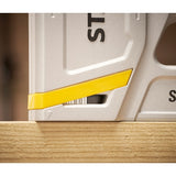 STANLEY STHT70150-0 photography of a silver square tool with yellow accent placed on wood.