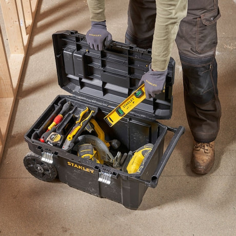 Photo of STANLEY STST1-80150 rolling toolbox filled with hand and power tools, lid open, top view.