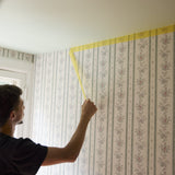 FrogTape Delicate Surface 36mm in use – masking next to wallpaper